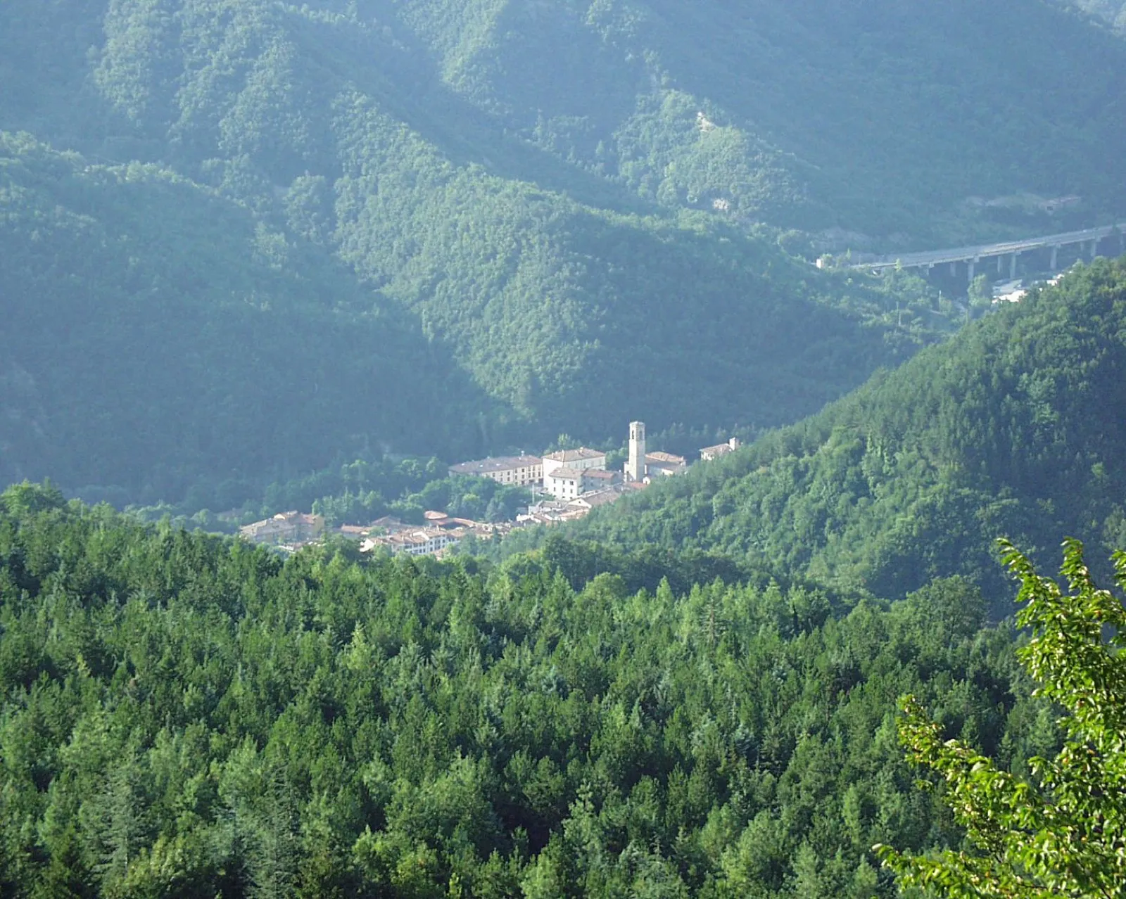 View of the village of Bagno di Romagna from Corzano Castle, roofs and bell towers among the hills